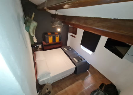 General view of bedroom with double bed
